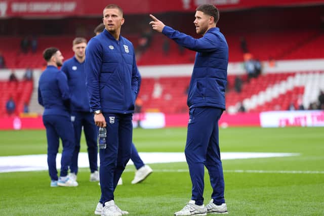 NOTTINGHAM, ENGLAND - NOVEMBER 30: Harry Clarke of Ipswich Town speaks with with teammate Wes Burns as they inspect the pitch prior to the Premier League match between Nottingham Forest FC and Ipswich Town FC at City Ground on November 30, 2024 in Nottingham, England. (Photo by Marc Atkins/Getty Images)