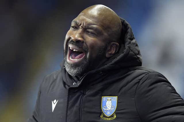 DISAPPOINTMENT AND RELIEF: Darren Moore saw many of his Sheffield Wednesday players underperform - but make it through to the third round of the FA Cup