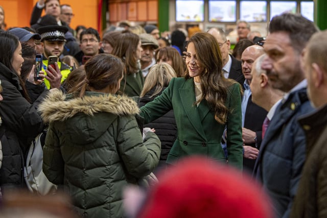 The Princess of Wales speaking to members of the public at Kirkgate Market.