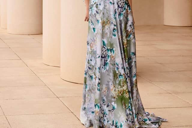 Blue floral print caped maxi dress, £465, at Snooty Frox in Harrogate.