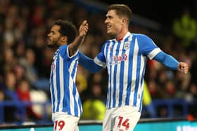 CALM: Huddersfield Town's Duane Holmes opens the scoring