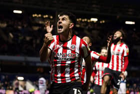 THAT'LL DO NICELY: Sheffield United's John Egan celebrates scoring his side's late equaliser to salvage a point against QPR at Loftus Road. Picture: Steven Paston/PA