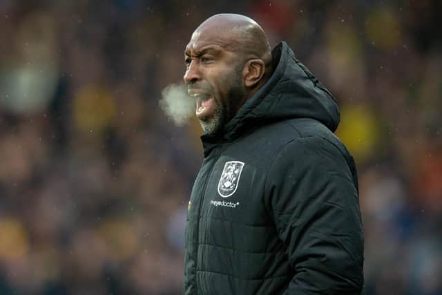 SACKED: Darren Moore's style of football never won over Huddersfield Town - and he struggled for wins too