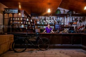Emma Grimmer, Collections Manager at Murton Park, York, Farming Museum, behind the shop counter of FR Stubbs Ironmongers, which used to be at Foss Bridge House, York. Picture By Yorkshire Post Photographer,  James Hardisty.