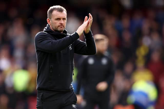 WATFORD, ENGLAND - OCTOBER 23: Nathan Jones, manager of Luton Town applauds the fans after the Sky Bet Championship match between Watford and Luton Town at Vicarage Road on October 23, 2022 in Watford, England. (Photo by Paul Harding/Getty Images)