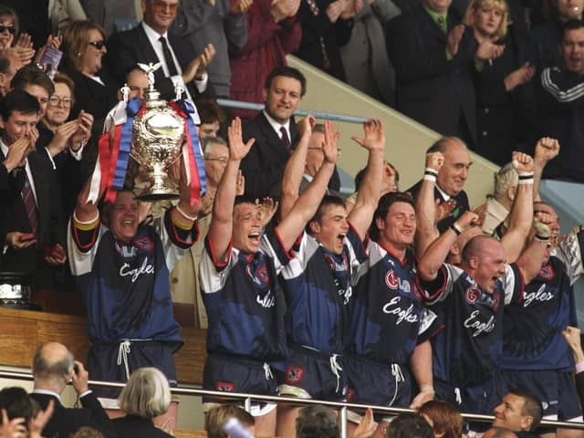 That winning feeling: Sheffield Eagles captain Paul Broadbent, with Mark Aston on his right, lifts the trophy aloft after the Silk Cut Challenge Cup final against Wigan Warriors at Wembley Stadium in London in 1998 (Picture: Mike Hewitt/Allsport)