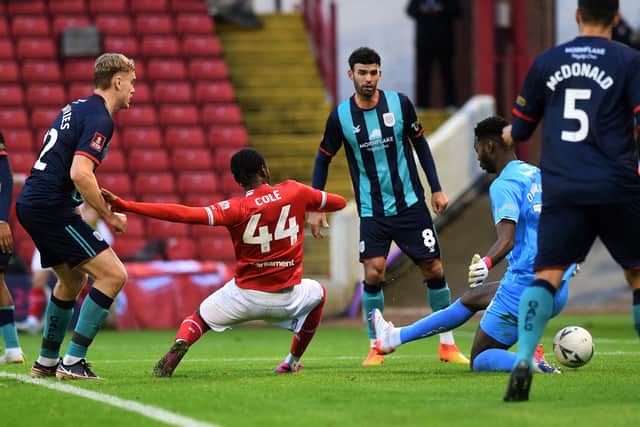 Barnsley striker Devante Cole stabs the Reds in front against Crewe on Saturday. Picture: Jonathan Gawthorpe