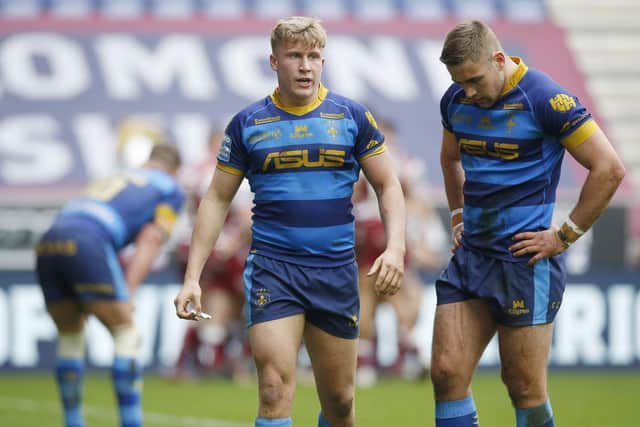 Wakefield Trinity's Sam Hewitt and Harry Bowes look dejected during the recent game at Wigan Warriors. (Photo: Ed Sykes/SWpix.com)