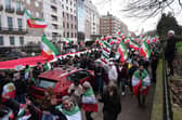 People march towards Downing Street, after taking part in a demonstration outside the Iranian Embassy in central London, in support of the US and Israeli strikes on Iran. Photo credit: Jonathan Brady/PA Wire