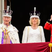 King Charles III and Queen Camilla on the balcony of Buckingham Palace, London, following the coronation. PIC: Leon Neal/PA Wire