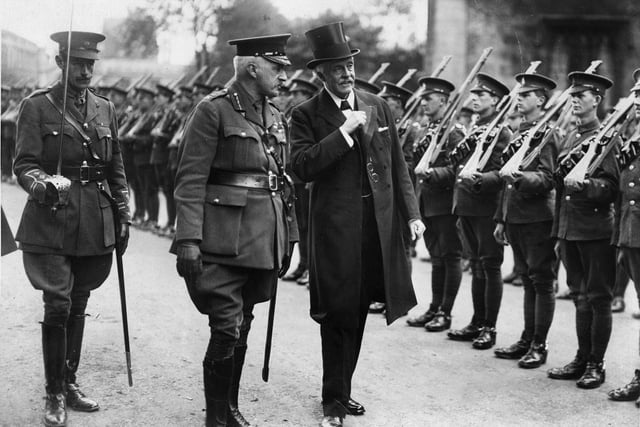 Scottish statesman Arthur James Balfour is seen inspecting troops at York Cathedral during the First World War.