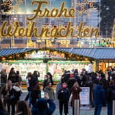 People visit the 'Christkindlmarkt' - Vienna's classic Christmas Market. (Pic credit: Georg Hochmuth / AFP via Getty Images)