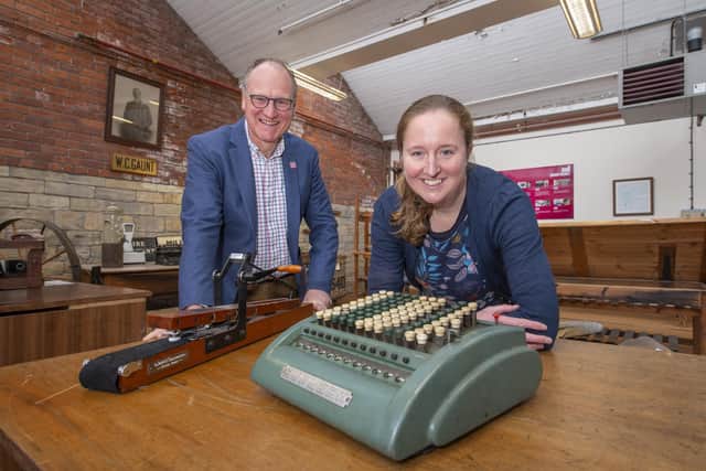 William Gaunt, owner of Sunny Bank Mills, and Rachel Moaby, curator of Sunny Bank Mills Archive, with a very early calculator