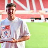 Swindon Town striker Jake Young - on loan from Bradford City - pictured with his Sky Bet League Two player-of-the-month award for August. Picture courtesy of the EFL.