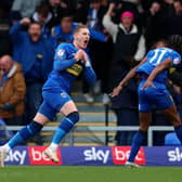 Ronan Curtis equalised for AFC Wimbledon - and saw red. Image: Tom Dulat/Getty Images
