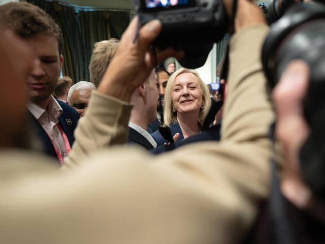 Former prime minister Liz Truss leaves the Great British Growth Rally, a fringe event where she spoke alongside Dame Priti Patel, Sir Jacob Rees-Mogg and Ranil Jayawardena during the Conservative Party conference in Manchester. PIC: Stefan Rousseau/PA Wire
