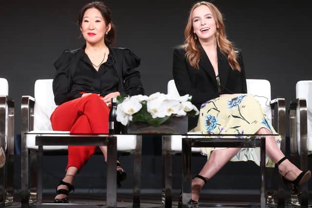 Actors Sandra Oh (L) and Jodie Comer of 'Killing Eve' speak onstage during the BBC America portion of the 2018 Winter Television Critics Association Press Tour at The Langham Huntington, Pasadena on January 12, 2018 in Pasadena, California.  (Photo by Frederick M. Brown/Getty Images)