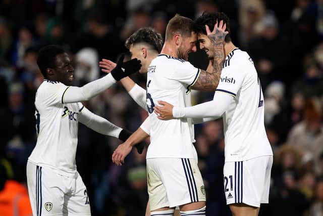 LEEDS, ENGLAND - DECEMBER 16: Pascal Struijk of Leeds celebrates with team mates after scoring his team's first goal of the game during the friendly match between Leeds United and Real Sociedad at Elland Road on December 16, 2022 in Leeds, England. (Photo by Jan Kruger/Getty Images)