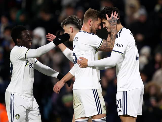 LEEDS, ENGLAND - DECEMBER 16: Pascal Struijk of Leeds celebrates with team mates after scoring his team's first goal of the game during the friendly match between Leeds United and Real Sociedad at Elland Road on December 16, 2022 in Leeds, England. (Photo by Jan Kruger/Getty Images)