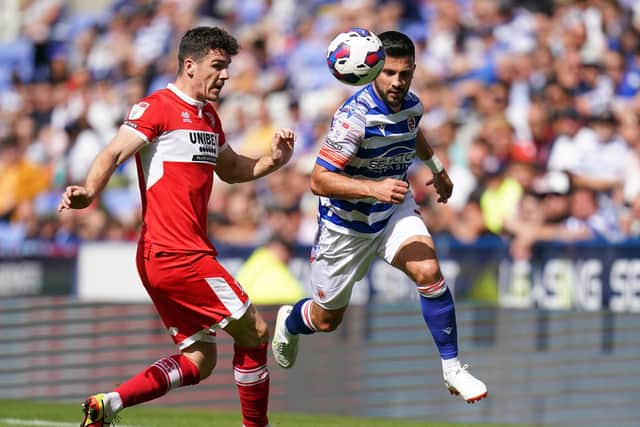 Reading's Shane Long (right) and Middlesbrough's Darragh Lenihan during the Sky Bet Championship match at Select Car Leasing Stadium, Reading. Picture: Adam Davy/PA Wire.