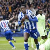 Full throttle: Anthony Musaba wheels away in celebration after giving Sheffield Wednesday the lead against West Brom in a huge game at Hillsborough (Picture: Steve Ellis)