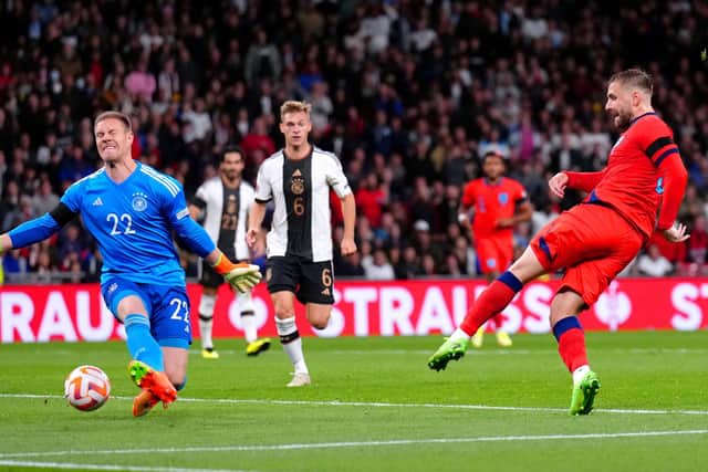 England's Luke Shaw (right) scores their side's first goal of the game during the UEFA Nations League clash against Germany at Wembley. Picture: John Walton/PA