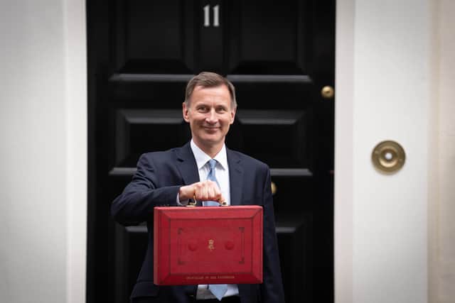 Chancellor of the Exchequer Jeremy Hunt leaves 11 Downing Street, London, with his ministerial box before delivering his Budget at the Houses of Parliament. PIC: Stefan Rousseau/PA Wire