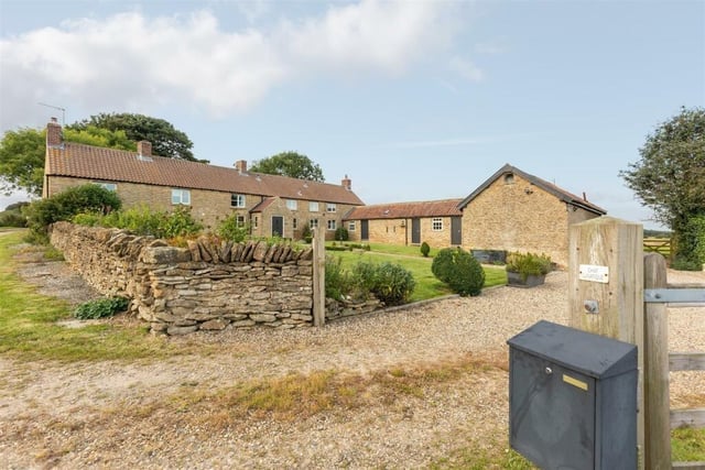The property comes with a range of outbuildings, garages and ample space for a number of cars