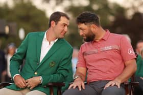 The odd couple: 2022 Masters champion Scottie Scheffler of the United States looks on with Jon Rahm of Spain during the Green Jacket Ceremony after Rahm won the 2023 tournament at Augusta National (Picture: Christian Petersen/Getty Images)