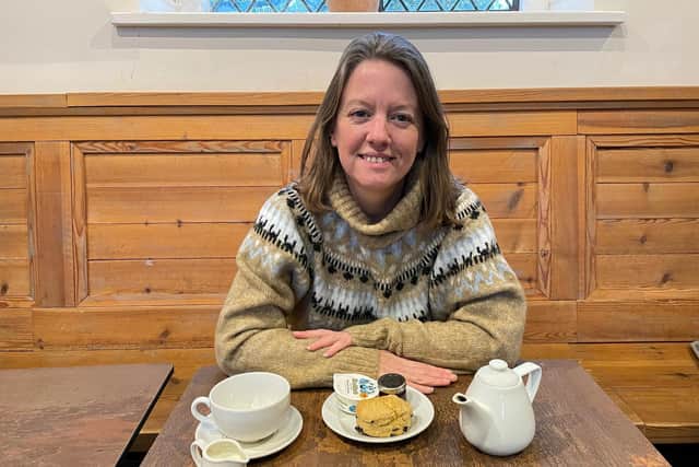 Sarah Merker, 49, from Isleworth, London, who has completed a decade-long project to sample a scone at every possible National Trust location
