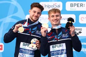 ROME, ITALY - AUGUST 21: Anthony Harding and Jack Laugher of Great Britain receive their Gold medal after winning the Men's 3m Springboard Final on Day 11 of the European Aquatics Championships Rome 2022 at the Stadio del Nuoto on August 21, 2022 in Rome, Italy. (Photo by Clive Rose/Getty Images)