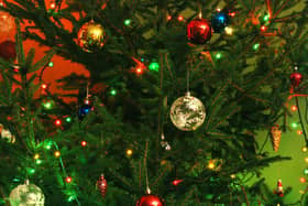 A photo of decorations on a real Christmas tree. PIC: PA