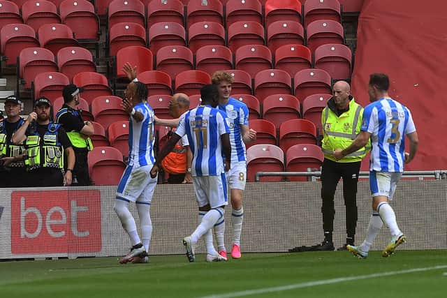 Middlesbrough v Huddersfield Town. Terriers' Sorba Thomas celebrates the visitors' opener at the Riverside with his team-mates. Picture: Jonathan Gawthorpe.