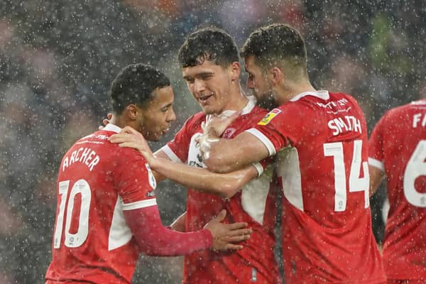 DOUBLE DELIGHT: Middlesbrough's Cameron Archer (left) celebrates with his team mates after scoring his second goal against Preston North End Picture: Owen Humphreys/PA
