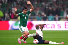 NO WAY THROUGH: England’s Ezri Konsa (right) battles with Mexico’s Raul Jimenez at Mexico City Stadium on Sunday night. Picture: Bradley Collyer/PA