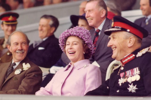 Her Majesty The Queen at the 1977 Great Yorkshire Show with (on left) President of the Yorkshire Agricultural Society, Major General Dalton CB CBE DL and (on right) the Lord Lieutenant of North Yorkshire the Marquis of Normanby CBE. (s)