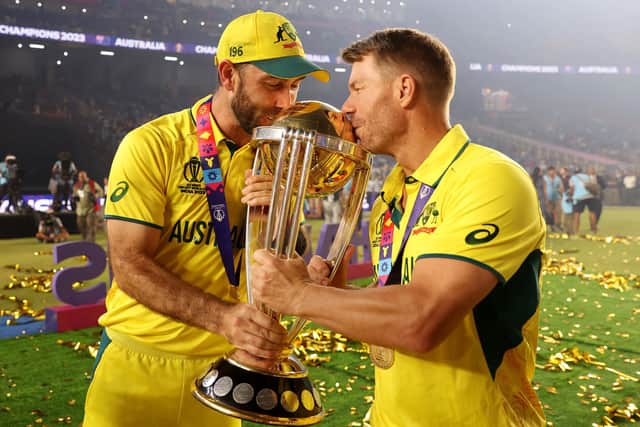 Glenn Maxwell and David Warner of Australia poses with the ICC Men's Cricket World Cup Trophy following the ICC Men's Cricket World Cup India 2023 Final between India and Australia (Picture: Robert Cianflone/Getty Images)