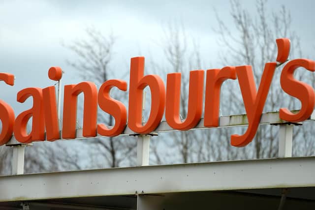 Supermarket giant Sainsbury’s has boosted its earnings outlook thanks to soaring grocery sales as it focused on keeping food costs down for cash-strapped customers. (Photo by Andrew Matthews/PA Wire)