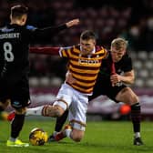 Doncaster Rovers defender Jay McGrath gets to grips with Bradford City striker Andy Cook - who was sent off late in the game on Tuesday night. Picture: Bruce Rollinson.
