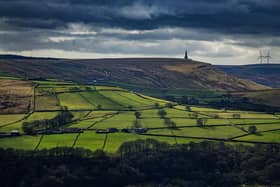 View from Midgley Moor of Stoodley Pike high above Hebden Bridge in Calderdale, photographed for the Yorkshire Post by Tony Johnson.