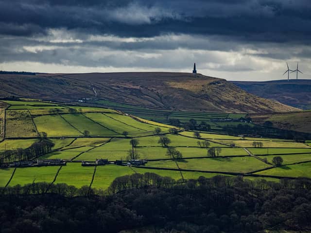 View from Midgley Moor of Stoodley Pike high above Hebden Bridge in Calderdale, photographed for the Yorkshire Post by Tony Johnson.