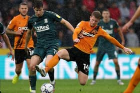 Hull City midfielder Andy Cannon (right), pictured in action against Middlesbrough rival Paddy McNair last season. Picture: PA