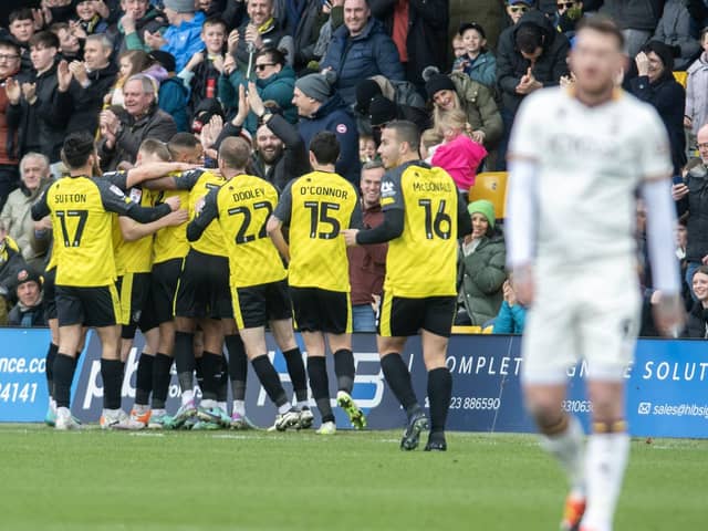 Harrogate Town players celebrate after Josh March's opener versus Bradford City. Picture: Tony Johnson.