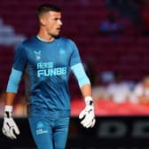 Karl Darlow of Newcastle United FC in action during the warm up before the start of the Eusebio Cup match between SL Benfica and Newcastle United at Estadio da Luz on July 26, 2022 in Lisbon, Portugal.  (Photo by Gualter Fatia/Getty Images)