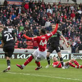 Barnsley's Devante Cole swivels and scores the third goal against Derby (Picture: Tony Johnson)