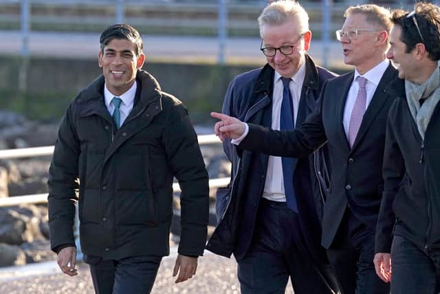 Prime Minister Rishi Sunak (left) and Minister for Levelling Up, Housing and Communities, Michael Gove (second left), during a community visit to the Eden Project North in Morecambe, Lancashire.