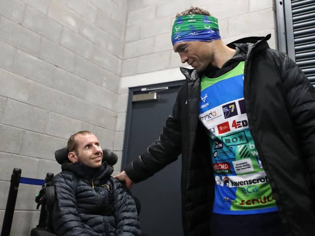 Former Leeds Rhinos player Rob Burrow, left, pictured with Kevin Sinfield during day six of the Ultra 7 in 7 Challenge. (Picture: PA)