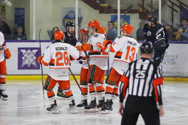 OPENING STRIKE: Sheffield Steelers' players celebrate Brett Neumann's opening goal in the 21st minute against Manchester Storm. Picture courtesy of Mark Ferriss/EIHL Media.