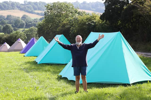 Glastonbury founder Michael Eavis with one of the tents made by Bradford company BCT Outdoors