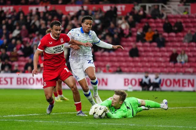 Middlesbrough's David Strelec and Sheffield Wednesday's Gabriel Otegbayo battle for the ball during the Sky Bet Championship match at the Riverside Stadium, Middlesbrough. Picture date: Wednesday April 22, 2026. PA Photo. Photo credit should read: Owen Humphreys/PA Wire.